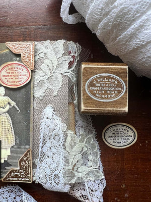 Vintage merchant rubber stamp and small round labels and lace junk journal from micmoc.com