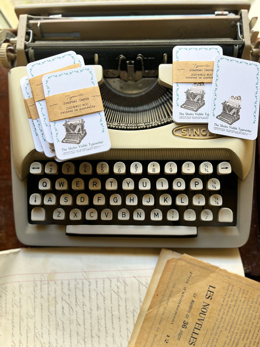 Vintage typewriter with vintage journal cards from micmo.com